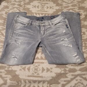 Silver Jeans Light Gray Distressed Mid Ankle Slim. W33 / L26